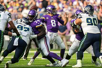 Sep 26, 2021; Minneapolis, Minnesota, USA; Minnesota Vikings quarterback Kirk Cousins (8) throws the ball during the first quarter against Seattle Seahawks at U.S. Bank Stadium. Mandatory Credit: Brace Hemmelgarn-USA TODAY Sports