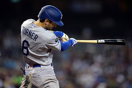 Sep 26, 2021; Phoenix, Arizona, USA; Los Angeles Dodgers shortstop Trea Turner (6) hits a double against the Arizona Diamondbacks during the third inning at Chase Field. Mandatory Credit: Joe Camporeale-USA TODAY Sports