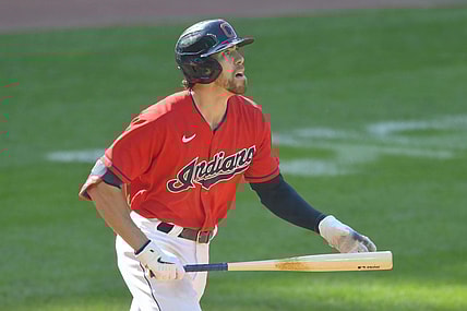 Sep 27, 2021; Cleveland, Ohio, USA; Cleveland Indians right fielder Bradley Zimmer (4) watches his solo home run in the eighth inning against the Kansas City Royals at Progressive Field. Mandatory Credit: David Richard-USA TODAY Sports