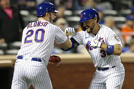 Sep 29, 2021; New York City, New York, USA; New York Mets right fielder Michael Conforto (30) celebrates with first baseman Pete Alonso (20) after hitting a solo home run against the Miami Marlins during the fourth inning at Citi Field. Mandatory Credit: Brad Penner-USA TODAY Sports
