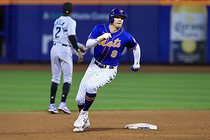 Sep 30, 2021; New York City, New York, USA; New York Mets center fielder Brandon Nimmo (9) rounds second base during an RBI single by right fielder Michael Conforto (not pictured) during the third inning against the Miami Marlins at Citi Field. Mandatory Credit: Vincent Carchietta-USA TODAY Sports