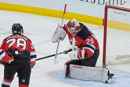 Apr 11, 2021; Newark, New Jersey, USA; New Jersey Devils goaltender Mackenzie Blackwood (29) makes a save in front of defenseman Damon Severson (28) during the first period against the Pittsburgh Penguins at Prudential Center. Mandatory Credit: Vincent Carchietta-USA TODAY Sports