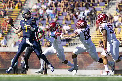 October 2, 2021; Berkeley, California, USA; California Golden Bears quarterback Chase Garbers (7) passes the football against Washington State Cougars defensive back Derrick Langford (5) and defensive end Brennan Jackson (80) and linebacker Justus Rogers (37) during the second quarter at FTX Field at California Memorial Stadium. Mandatory Credit: Kyle Terada-USA TODAY Sports