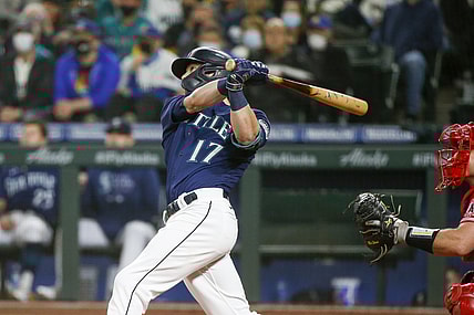 Oct 2, 2021; Seattle, Washington, USA; Seattle Mariners right fielder Mitch Haniger (17) hits a two-run home run against the Los Angeles Angels during the fifth inning at T-Mobile Park. Mandatory Credit: Joe Nicholson-USA TODAY Sports