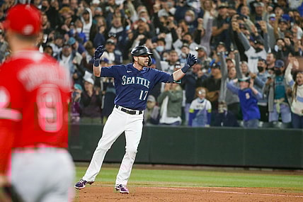 Oct 2, 2021; Seattle, Washington, USA; Seattle Mariners right fielder Mitch Haniger (17) reacts after hitting a two-RBI single against the Los Angeles Angels during the eighth inning at T-Mobile Park. Mandatory Credit: Joe Nicholson-USA TODAY Sports