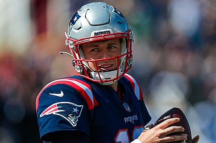 Sep 26, 2021; Foxborough, Massachusetts, USA;  New England Patriots quarterback Mac Jones (10) looks on against New Orleans Saints during the first half at Gillette Stadium. Mandatory Credit: Stephen Lew-USA TODAY Sports