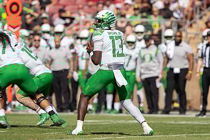 Oct 2, 2021; Stanford, California, USA;  Oregon Ducks quarterback Anthony Brown (13) prepares to throw the football during the second quarter against the Stanford Cardinal at Stanford Stadium. Mandatory Credit: Stan Szeto-USA TODAY Sports