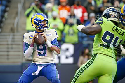 Oct 7, 2021; Seattle, Washington, USA; Los Angeles Rams quarterback Matthew Stafford (9) looks to pass against the Seattle Seahawks during the first quarter at Lumen Field. Mandatory Credit: Joe Nicholson-USA TODAY Sports