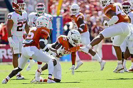 Oct 9, 2021; Dallas, Texas, USA; Texas Longhorns defensive back B.J. Foster (25) reacts after intercepting a pass against the Oklahoma Sooners during the first quarter at the Cotton Bowl. Mandatory Credit: Kevin Jairaj-USA TODAY Sports