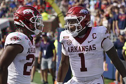 Oct 9, 2021; Oxford, Mississippi, USA; Arkansas Razorbacks quarterback KJ Jefferson (1) celebrates with Arkansas Razorbacks running back Dominique Johnson (20) after Jefferson scored a touchdown against Mississippi Rebels at Vaught-Hemingway Stadium. Mandatory Credit: Marvin Gentry-USA TODAY Sports