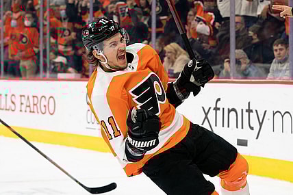 Oct 18, 2021; Philadelphia, Pennsylvania, USA; Philadelphia Flyers right wing Travis Konecny (11) celebrates after scoring against the Seattle Kraken during the first period at Wells Fargo Center. Mandatory Credit: Bill Streicher-USA TODAY Sports
