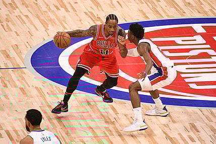 Oct 20, 2021; Detroit, Michigan, USA; Chicago Bulls forward DeMar DeRozan (11) drives to the basket as Detroit Pistons guard Hamidou Diallo (6) defends during the third quarter at Little Caesars Arena. Mandatory Credit: Tim Fuller-USA TODAY Sports