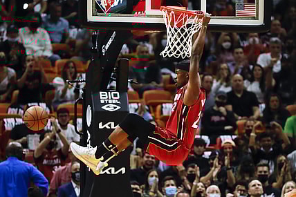 Oct 21, 2021; Miami, Florida, USA; Miami Heat forward Jimmy Butler (22) dunks the ball against the Milwaukee Bucks during the first period of the game at FTX Arena. Mandatory Credit: Sam Navarro-USA TODAY Sports