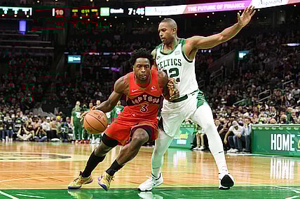 Oct 22, 2021; Boston, Massachusetts, USA; Toronto Raptors forward OG Anunoby (3) drives to the basket against Boston Celtics center Al Horford (42) during the first half at the TD Garden. Mandatory Credit: Brian Fluharty-USA TODAY Sports