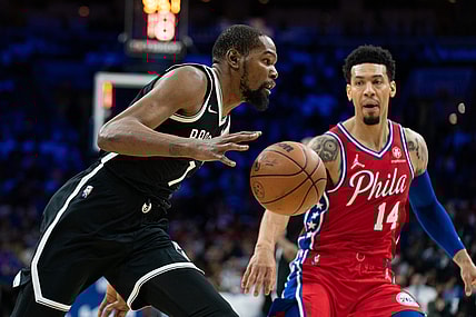 Oct 22, 2021; Philadelphia, Pennsylvania, USA; Brooklyn Nets forward Kevin Durant (7) drives against Philadelphia 76ers forward Danny Green (14) during the first quarter at Wells Fargo Center. Mandatory Credit: Bill Streicher-USA TODAY Sports