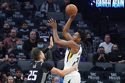 October 22, 2021; Sacramento, California, USA; Utah Jazz center Hassan Whiteside (21) shoots the basketball against Sacramento Kings center Alex Len (25) during the first quarter at Golden 1 Center. Mandatory Credit: Kyle Terada-USA TODAY Sports