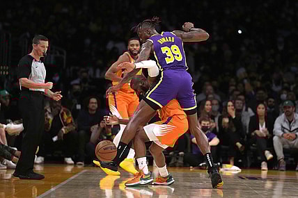 Oct 22, 2021; Los Angeles, California, USA; Phoenix Suns guard Chris Paul (3) is defended by Los Angeles Lakers center Dwight Howard (39) in the first half at Staples Center. Mandatory Credit: Kirby Lee-USA TODAY Sports