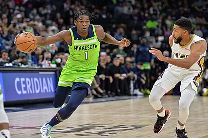 Oct 23, 2021; Minneapolis, Minnesota, USA; Minnesota Timberwolves forward Anthony Edwards (1) drives past New Orleans Pelicans guard Garrett Temple (41) during the second quarter at Target Center. Mandatory Credit: Jeffrey Becker-USA TODAY Sports