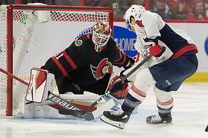Oct 25, 2021; Ottawa, Ontario, CAN; Ottawa Senators goalie Anton Forsberg (31) makes a save on a shot from Washington Capitals right wing Garnet Hathaway (21) in the first period at the Canadian Tire Centre. Mandatory Credit: Marc DesRosiers-USA TODAY Sports