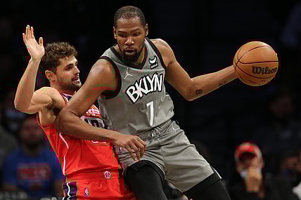 Oct 25, 2021; Brooklyn, New York, USA; Brooklyn Nets forward Kevin Durant (7) controls the ball against Washington Wizards guard Raul Neto (19) during the first quarter at Barclays Center. Mandatory Credit: Brad Penner-USA TODAY Sports