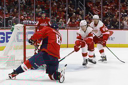 Oct 27, 2021; Washington, District of Columbia, USA; Washington Capitals left wing Alex Ovechkin (8) scores a goal on Detroit Red Wings goaltender Thomas Greiss (29) during the first period at Capital One Arena. Mandatory Credit: Geoff Burke-USA TODAY Sports