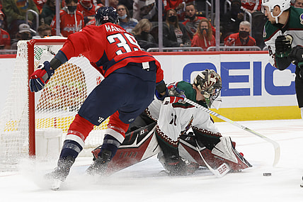 Oct 29, 2021; Washington, District of Columbia, USA; Arizona Coyotes goaltender Karel Vejmelka (70) makes a save on Washington Capitals right wing Anthony Mantha (39) during the first period at Capital One Arena. Mandatory Credit: Geoff Burke-USA TODAY Sports