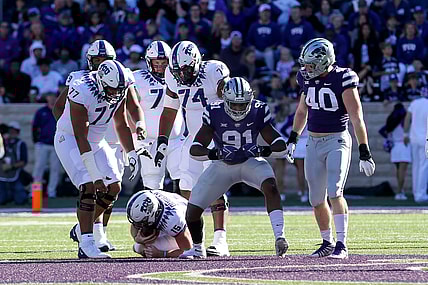 Oct 30, 2021; Manhattan, Kansas, USA; Kansas State Wildcats defensive end Felix Anudike-Uzomah (91) celebrates the sack of TCU Horned Frogs quarterback Max Duggan (15) during the first quarter at Bill Snyder Family Football Stadium. Mandatory Credit: Scott Sewell-USA TODAY Sports