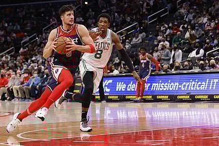Oct 30, 2021; Washington, District of Columbia, USA; Washington Wizards forward Deni Avdija (9) drives to the basket as Boston Celtics guard Josh Richardson (8) defends during the first quarter at Capital One Arena. Mandatory Credit: Geoff Burke-USA TODAY Sports