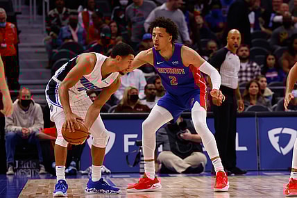 Oct 30, 2021; Detroit, Michigan, USA;  Detroit Pistons guard Cade Cunningham (2) defends Orlando Magic guard Jalen Suggs (4) in the first half at Little Caesars Arena. Mandatory Credit: Rick Osentoski-USA TODAY Sports