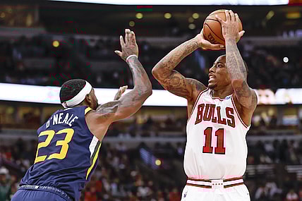 Oct 30, 2021; Chicago, Illinois, USA; Chicago Bulls forward DeMar DeRozan (11) shoots against Utah Jazz forward Royce O'Neale (23) during the second half at United Center. Mandatory Credit: Kamil Krzaczynski-USA TODAY Sports