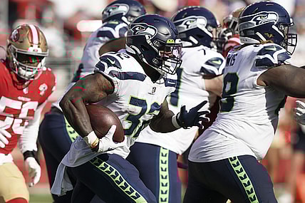 Oct 3, 2021; Santa Clara, California, USA; Seattle Seahawks running back Chris Carson (32) rushes during the fourth quarter against the San Francisco 49ers at Levi's Stadium. Mandatory Credit: Darren Yamashita-USA TODAY Sports