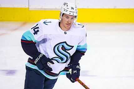Sep 29, 2021; Calgary, Alberta, CAN; Seattle Kraken right wing Nathan Bastian (14) skates during the warmup period against the Calgary Flames at Scotiabank Saddledome. Mandatory Credit: Sergei Belski-USA TODAY Sports