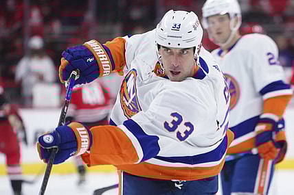 Oct 14, 2021; Raleigh, North Carolina, USA;  New York Islanders defenseman Zdeno Chara (33) takes a shot before the game against the Carolina Hurricanes at PNC Arena. Mandatory Credit: James Guillory-USA TODAY Sports