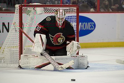 Oct 23, 2021; Ottawa, Ontario, CAN; Ottawa Senators goalie Matt Murray (30) makes a save in the first period against the New York Rangers at the Canadian Tire Centre. Mandatory Credit: Marc DesRosiers-USA TODAY Sports