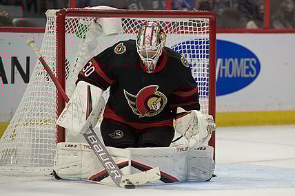 Oct 23, 2021; Ottawa, Ontario, CAN; Ottawa Senators goalie Matt Murray (30) makes a save in the first period against the New York Rangers at the Canadian Tire Centre. Mandatory Credit: Marc DesRosiers-USA TODAY Sports