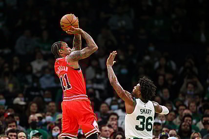 Nov 1, 2021; Boston, Massachusetts, USA; Chicago Bulls forward DeMar DeRozan (11) shoots over Boston Celtics guard Marcus Smart (36) at TD Garden. Mandatory Credit: Paul Rutherford-USA TODAY Sports