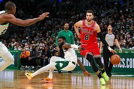 Nov 1, 2021; Boston, Massachusetts, USA; Chicago Bulls guard Zach LaVine (8) drives to the basket defended by Boston Celtics forward Jaylen Brown (7) during the second half at TD Garden. Mandatory Credit: Paul Rutherford-USA TODAY Sports