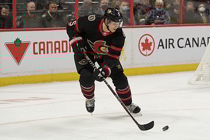 Nov 4, 2021; Ottawa, Ontario, CAN; Ottawa Senators defenseman Nick Holden (5) skates with the puck in the first period against the Vegas Golden Knights at the Canadian Tire Centre. Mandatory Credit: Marc DesRosiers-USA TODAY Sports