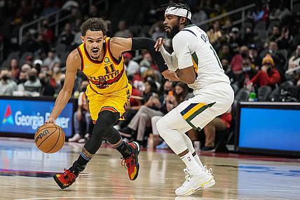 Nov 4, 2021; Atlanta, Georgia, USA; Atlanta Hawks guard Trae Young (11) works to get past Utah Jazz guard Mike Conley (11) during the first half at State Farm Arena. Mandatory Credit: Dale Zanine-USA TODAY Sports