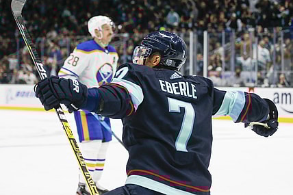 Nov 4, 2021; Seattle, Washington, USA; Seattle Kraken right wing Jordan Eberle (7) celebrates after scoring a goal against the Buffalo Sabres during the second period at Climate Pledge Arena. Mandatory Credit: Joe Nicholson-USA TODAY Sports