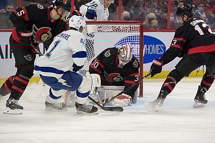 Nov 6, 2021; Ottawa, Ontario, CAN; Ottawa Senators goalie Matt Murray (30) makes a save in front of Tampa Bay Lightning left wing Pierre-Edouard Bellemare (41) in the first period at the Canadian Tire Centre. Mandatory Credit: Marc DesRosiers-USA TODAY Sports