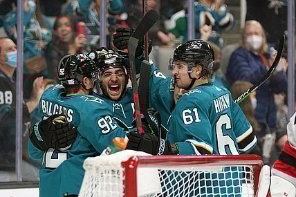 Nov 6, 2021; San Jose, California, USA; San Jose Sharks players celebrate after a goal by left wing Rudolfs Balcers (92) during the second period against the New Jersey Devils at SAP Center at San Jose. Mandatory Credit: Darren Yamashita-USA TODAY Sports