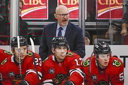 Nov 7, 2021; Chicago, Illinois, USA; Chicago Blackhawks interim head coach Derek King yells to his team during the first period of an NHL game against the Nashville Predators at United Center. Mandatory Credit: Kamil Krzaczynski-USA TODAY Sports