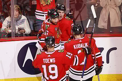 Nov 7, 2021; Chicago, Illinois, USA; Chicago Blackhawks left wing Brandon Hagel (38) celebrates with teammates after scoring against the Nashville Predators during the second period at United Center. Mandatory Credit: Kamil Krzaczynski-USA TODAY Sports