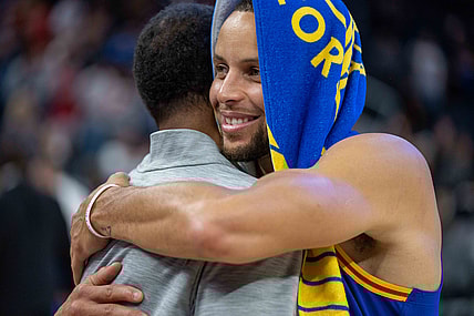 Nov 7, 2021; San Francisco, California, USA;  after the game Golden State Warriors guard Stephen Curry (30) hugs Houston Rockets head coach Stephen Silastt at Chase Center. Mandatory Credit: Neville E. Guard-USA TODAY Sports