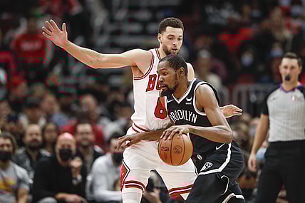 Nov 8, 2021; Chicago, Illinois, USA; Chicago Bulls guard Zach LaVine (8) defends against Brooklyn Nets forward Kevin Durant (7) during the first half at United Center. Mandatory Credit: Kamil Krzaczynski-USA TODAY Sports