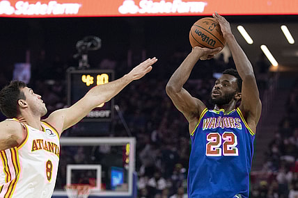 November 8, 2021; San Francisco, California, USA; Golden State Warriors forward Andrew Wiggins (22) shoots the basketball against Atlanta Hawks forward Danilo Gallinari (8) during the first quarter at Chase Center. Mandatory Credit: Kyle Terada-USA TODAY Sports