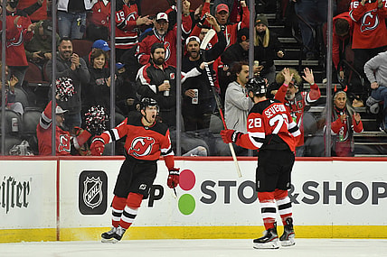 Nov 9, 2021; Newark, New Jersey, USA; New Jersey Devils left wing Andreas Johnsson (11) reacts after scoring a goal against the Florida Panthers during the first period at Prudential Center. Mandatory Credit: Catalina Fragoso-USA TODAY Sports