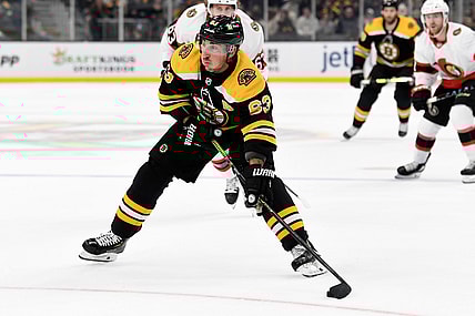 Nov 9, 2021; Boston, Massachusetts, USA; Boston Bruins center Brad Marchand (63) skates with the puck against the Ottawa Senators during the first period at the TD Garden. Mandatory Credit: Brian Fluharty-USA TODAY Sports
