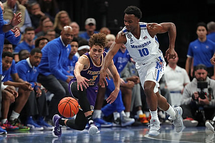 Nov 9, 2021; Memphis, Tennessee, USA; Tennessee Tech Golden Eagles guard Keishawn Davidson (3) looses control of the ball to Memphis Tigers guard Alex Lomax (10) during the first half at FedExForum. Mandatory Credit: Petre Thomas-USA TODAY Sports